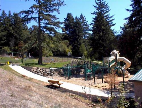 Playground and riverside area at Willamette Park in the Willamette neighborhood of West Linn, near Little Nestlings preschool.